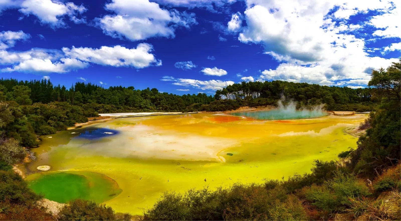 Yellow and green mineral flats of the Artist's Palette under a blue sky